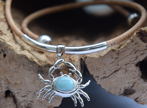 Larimar crab necklace on cork with 4x20mm sterling silver tube accents displayed on driftwood — Crabby Mermaid