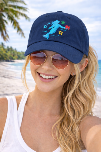 Model wearing navy Crabby Mermaid original embroidered hat — low profile unconstructed fit — Crabby Mermaid