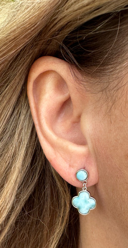 Larimar clover flower drop earring worn on model — round Larimar stud top with clover pendant drop — .925 sterling silver — Crabby Mermaid