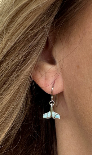 Natural Larimar Whales Tail Dangle .925 Sterling Silver Earrings

Dive right into the magnificent power and grace of one of the Earth's most majestic creatures with these beautiful Natural Larimar Whale Tail Dangle Earrings in .925 Sterling Silver. Shimmering Larimar and Sterling Silver make these stunning french hook wire earrings a must-have for all ocean lovers' treasure chests. Whether hanging out with friends or out on the town, these gorgeous earrings are sure to catch everyone's eye. Pair these beauties with one of our Larimar Whales Tail necklaces for a complete look.

About the Larimar Whale Tail Dangle Earrings:

Made With Genuine Larimar Stones
French Hook Wire
Larimar Whales Tail Pendant .75"
.925 Sterling Silver Drop Earrings