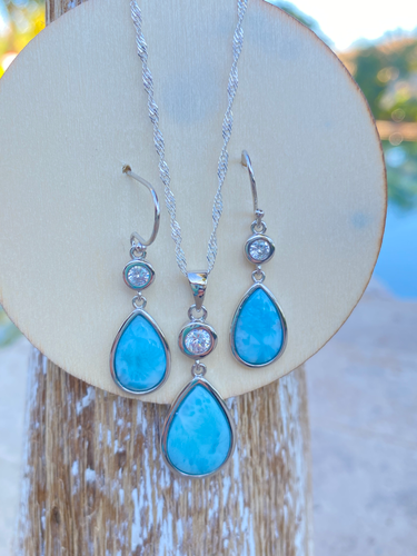 Teardrop Natural Larimar & Cubic Zirconia .925 Sterling Silver Necklace & Earrings Set

Inspired by the ocean, this desirable Larimar set features a set of teardrop earrings with Larimar and Cubic Zirconia and a matching necklace on an 18" Sterling Silver chain.