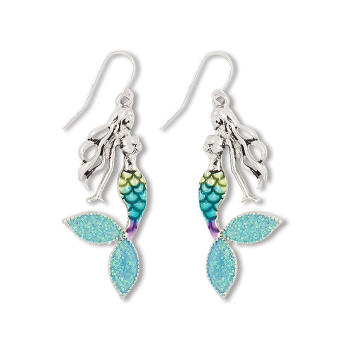Silver-toned glittering mermaid dangle earrings with colorful ombre scales and aqua glitter tail fin on white background — coastal jewelry — Crabby Mermaid