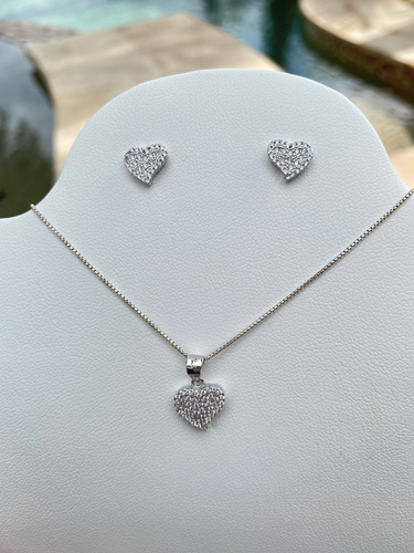 Micro Pave Cubic Zirconia Heart Sterling Silver Earrings & Necklace Set - 18"

Elevate your outfit style with our delicate Micro Pave Cubic Zirconia Heart Sterling Silver Earrings & Necklace Set. They're sure to sparkle up any outfit. Made of Sterling silver and cubic zirconia on an 18-inch chain, this stunning set is the perfect duo to let you shimmer in class. Whatever your day calls, we've covered you with this classic set.  

This set makes a perfect gift for that special someone in your life!