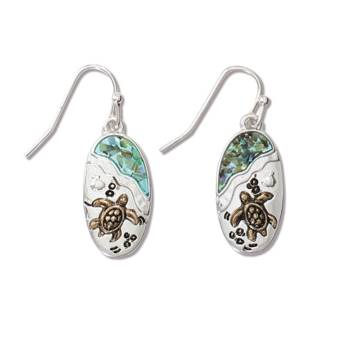 Silver-toned oval dangle earrings with abalone ocean inlay and gold-toned sea turtle beach scene on white background — coastal jewelry — Crabby Mermaid