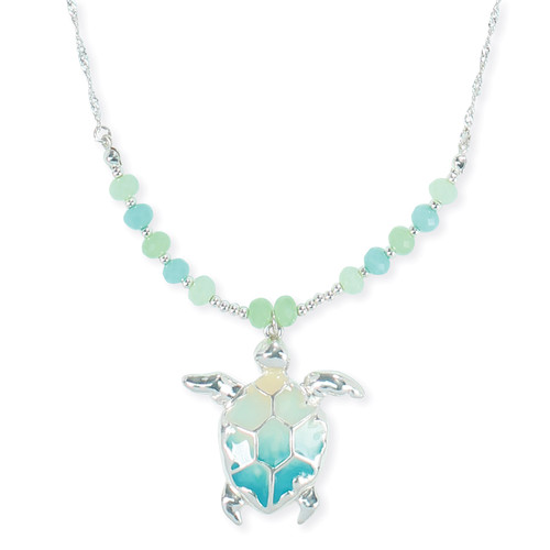 Silver-toned ombre sea turtle pendant necklace with aqua and mint faceted bead strand on white background - coastal jewelry - Crabby Mermaid