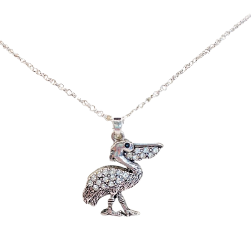 Silver-toned crystal-studded pelican pendant necklace on white background — coastal jewelry — Crabby Mermaid