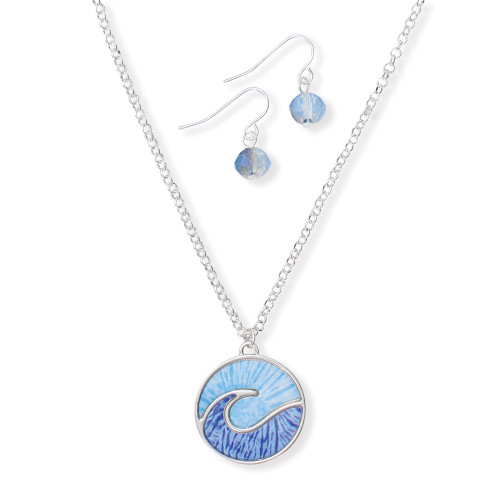Blue enamel wave disc pendant necklace and matching blue crystal dangle earring set on white background — coastal jewelry set — Crabby Mermaid