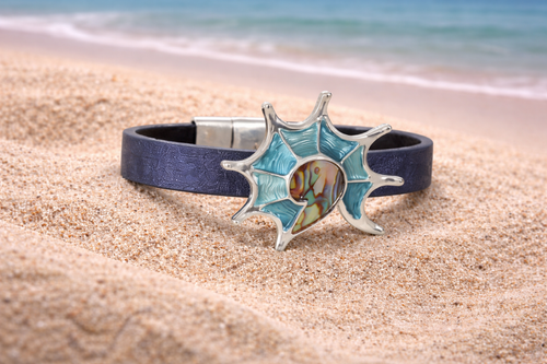 Blue abalone conch shell bracelet with iridescent ocean tones magnetic closure coastal jewelry