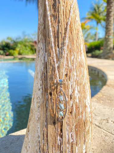 Larimar Turtle .925 Sterling Silver Necklace - 18

Pendant Dimension:1.5"

This beautiful turtle pendant necklace is perfection!  We love the unique shape and it's very light for everyday wear.