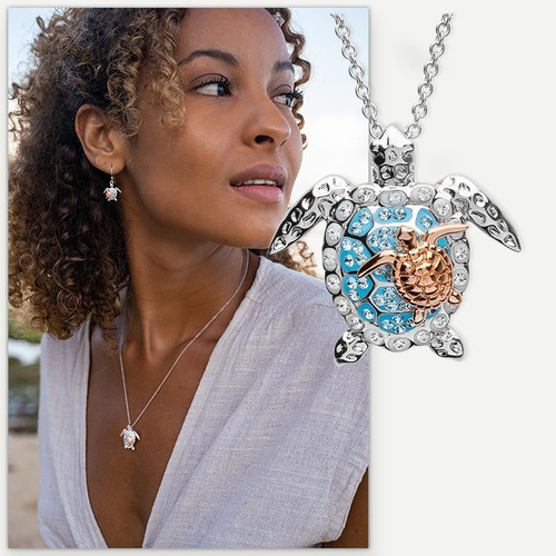 Elegant ocean-themed turtle necklace for moms, featuring a mother and baby turtle pendant in sterling silver with crystals.