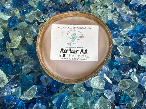 Moonflower Musk Half Shell Coconut Candle - 5.5 oz

Discover the sophisticated and enchanting Moonflower Musk Half Shell Coconut Candle, a perfect blend of sweet fruity top notes, floral middle notes, and musky base notes for a captivating and calming scent. Boasting a generous 5.5 ounces of wax, this luxurious candle adds a hint of mystery and allure to any atmosphere.

These candles also make an ideal gift. Be sure to check out our entire collection of fragrances.

Note Profile:

Top: Agave, Pear, Saffron, Bergamot 

Middle: Cherry Blossom, Rose, Marine, Violet, Lily 

Base: Amber, Dark Musk, Powder, Vetiver 

5.5 oz - lasts 20-25 hours and is great for small/medium size rooms

Ingredients: All natural soy and coconut waxes, phthalate-free premium fragrance oils and essential oils, concentrated dyes, and a cotton wick.

Our coconut candles are hand-poured into real, up-cycled coconuts in San Diego, CA., Made exclusively for Crabby Mermaid.

Never leave a Backyard Candle burning unattended. Do not burn for more than 4 hours at a time. Keep wick trimmed to 1/4 in. before each lighting. Burn only on a stable, heat-resistant surface/plate. Do not burn directly on countertops or near anything that could catch fire. Discontinue use if the coconut shell cracks. Keep out of reach of children and pets.