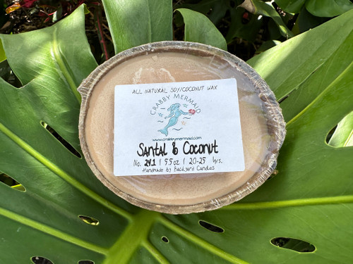 Santal & Coconut Half Shell Coconut Candle - 5.5 oz

Our Santal & Coconut Half Shell Coconut Candle is a new favorite for the sophisticated and relaxed soul. An exclusive blend of Benzoin, Coconut Milk, Sandalwood, Cedar, Tonka Bean, and Amyris produces a delightful aroma of creamy coconut and luxurious wood that will whisk you away to a tranquil paradise. Each candle is carefully poured into a unique coconut shell, giving off a charming and calming atmosphere with each spark. Ideal for backyard barbecues and summer celebrations, these scented candles are the perfect way to enjoy good vibes.  These candles also make an ideal gift. Be sure to check out our entire collection of fragrances.

Note Profile:

Top: Benzoin, Coconut Milk

Middle: Coconut, Sandalwood

Base: Cedar, Tonka Bean, Amyris

 Ingredients: All-natural soy and coconut waxes, phthalate-free premium fragrance oils and essential oils, concentrated dyes, and a cotton wick.



5.5oz - lasts 20-25 hours and is great for small/medium size rooms

Our coconut candles are hand-poured into natural, up-cycled coconuts in San Diego, CA., Made exclusively for Crabby Mermaid.

Never leave a candle burning unattended. Refrain from burning for more than 4 hours at a time. Keep the wick trimmed to 1/4 in. before each lighting. Burn only on a stable, heat-resistant surface/plate. Do not burn directly on countertops or near anything that could catch fire. Discontinue use if the coconut shell cracks. Keep out of reach of children and pets.