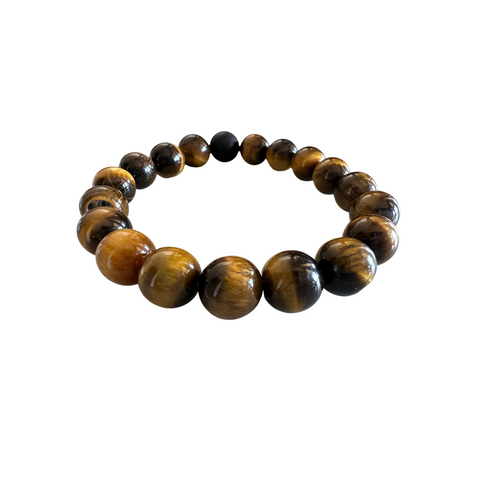Tiger eye 10mm gemstone beaded stretch bracelet on white background ‚Äî rich golden brown and charcoal beads ‚Äî Crabby Mermaid