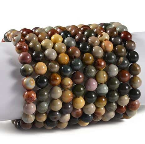 Stack of polychrome jasper gemstone beaded stretch bracelets showing natural color variation — Crabby Mermaid