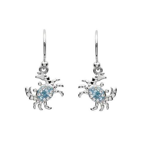 Enhance your style with our Sterling Silver Blue Swarovski Crystal Crab Drop Earrings. Crafted with precision and adorned with dazzling Swarovski crystals, these earrings exude elegance and marine-inspired allure. Perfect for any occasion. Shop now at Crabby Mermaid!

Get ready to bring the beach vibes to your wardrobe with these stunning Sterling Silver Blue Swarovski Crystal Crab Drop Earrings! These coastal-inspired earrings are perfect for those who love to add a touch of unconventional design and colorful style to their look. Each earring is crafted with care from high-quality Sterling silver and embellished all over with clear and sparkling crystals, creating a shimmering effect that will catch everyone's eye.

The drop part of these earrings is designed like a crab, adding a touch of whimsy and charm to your overall look. Each earring hangs from one claw on a thin wire hook, creating an eye-catching slanting look that is sure to turn heads wherever you go. Whether you're heading to the beach or just want to add some beach-inspired flair to your everyday outfits, these earrings are sure to do the trick.

So why wait? Add these stunning Sterling Silver Blue Swarovski Crystal Crab Drop Earrings to your jewelry collection today and get ready to turn heads and make a statement with your unique and exciting style!