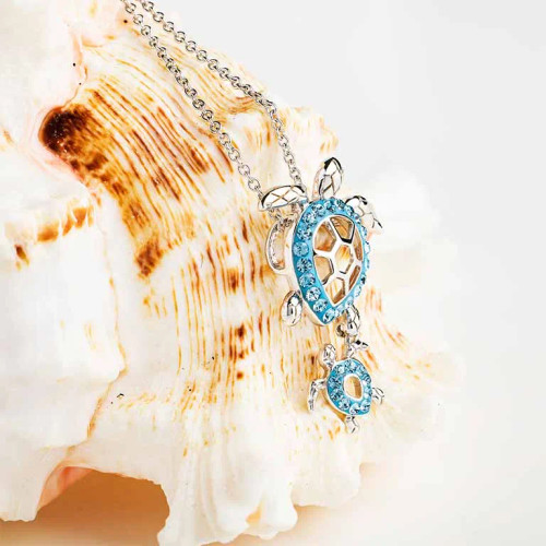 925 sterling silver sea turtle necklace with sparkling aqua crystals, handmade in Ireland – a timeless marine-life jewelry piece.