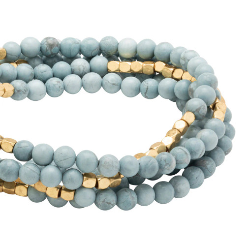 Discover the Stone Wrap Blue Howlite Bracelet that transforms into a necklace! Known as the Stone of Harmony, this 34" accessory promotes peace, balance, and relaxation. Stylish and versatile for any look!