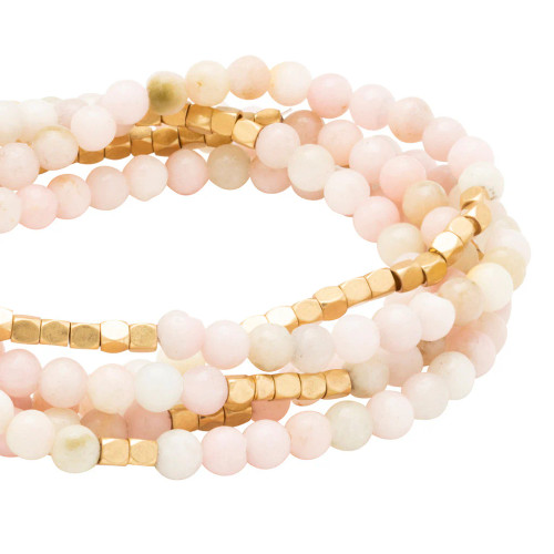 Discover the Stone Wrap Pink Opal Bracelet that becomes a necklace! Known as the Stone of Renewal, this 34" accessory promotes emotional healing, personal growth, and fresh energy. Versatile and stylish!
