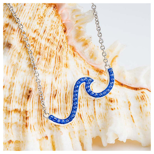 Sterling silver rising wave pendant with single row sapphire crystals ‚Äî Dublin Assay Office hallmarked Irish coastal jewelry