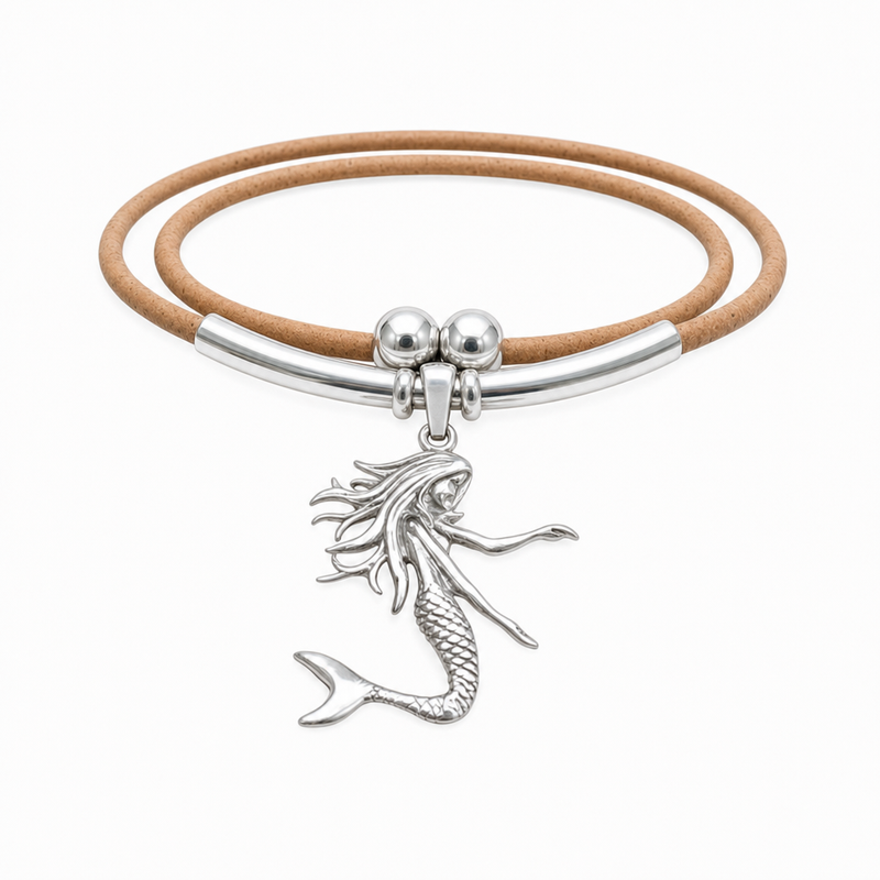 Sterling silver dancing mermaid pendant on natural Portuguese cork necklace, white background — Crabby Mermaid