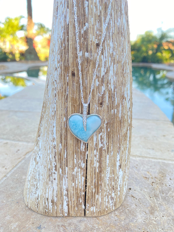 Larimar heart necklace with cubic zirconia accent displayed on driftwood showing chain — hand assembled by Crabby Mermaid