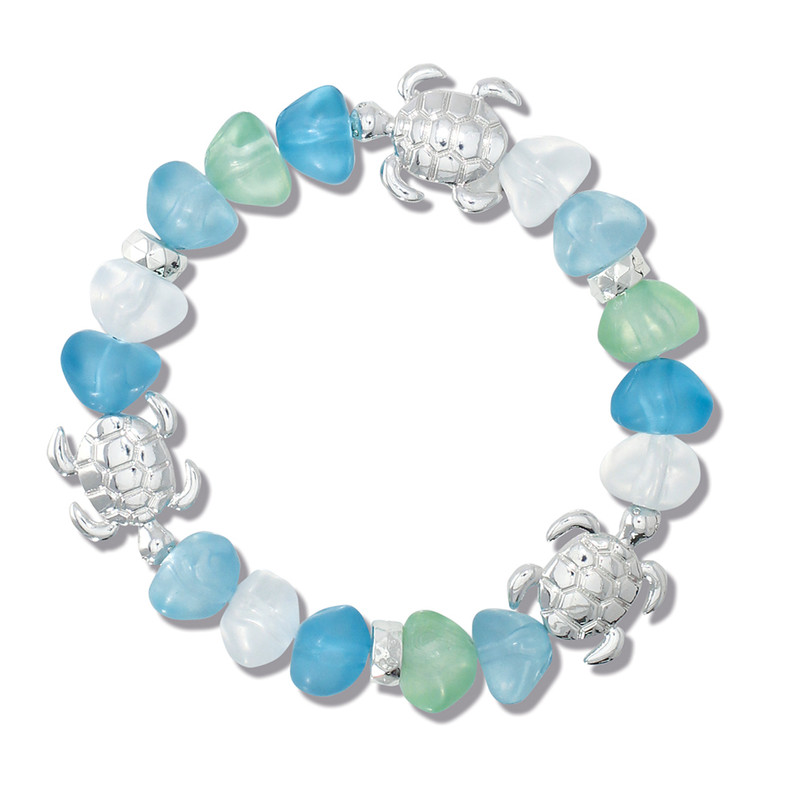 Sea glass turtle stretch bracelet with blue green and white frosted glass beads and silver turtle accents on white background — Crabby Mermaid