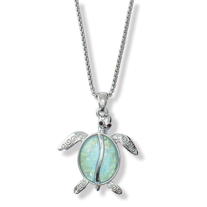 Silver-toned sea turtle pendant necklace with luminous aqua enamel shell on white background — coastal jewelry — Crabby Mermaid