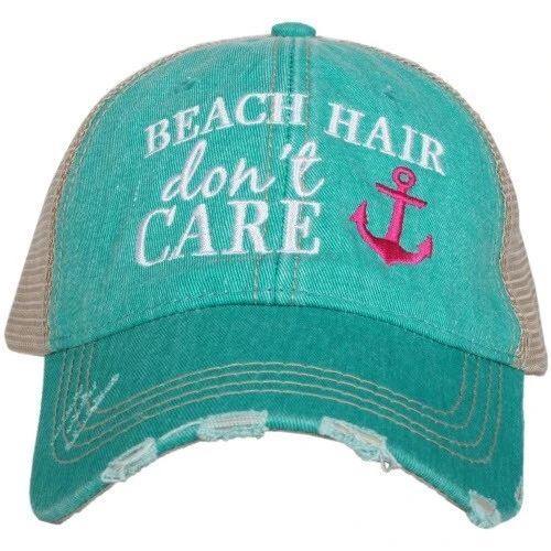 Teal distressed trucker hat with Beach Hair Don't Care embroidery and pink anchor graphic — tan mesh back and adjustable closure — Crabby Mermaid