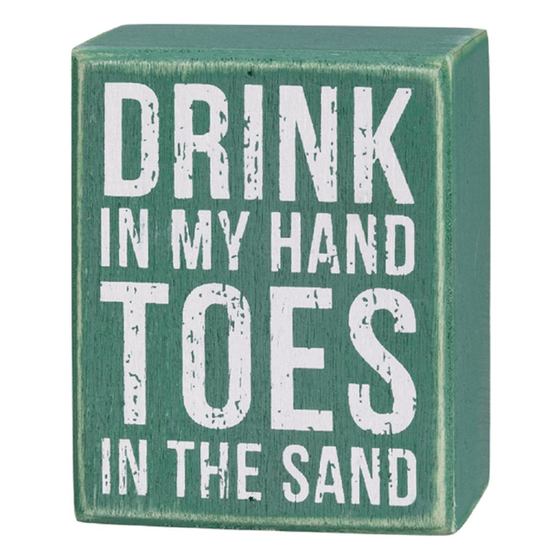 Drink In My Hand Toes In The Sand Box Sign

A wooden box sign featuring a beachy green background with distressed text. Easy to hang or can stand free alone.
Dimensions: 2.75" x 3.50" x 1.75"
Material: Wood
Artist: Primitives by Kathy
Product Text: DRINK IN MY HAND TOES IN THE SAND