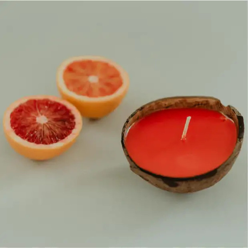 Grapefruit & Orange Half Shell Coconut Candle - 5.5 oz

This fragrance screams citrus. Top notes of grapefruit, orange and bergamot essential oils create a succulent blend of crisp and sweet that is oh so delicious! And a floral and green middle add a soothing touch to this true to life fragrance.