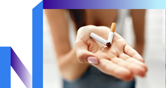 A woman confidently holds a cigarette, exuding calm and contemplation.