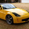 2003-2005 Nissan 350Z Switchback Sequential Turn Signal Animated LED Bar Projector Headlights (Matte Black Housing/Smoked Lens)
