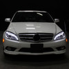 2008-2011 Mercedes Benz W204 C Class Projector Headlights w/ LED Light Bar & LED Turn Signal Lights (Chrome Housing/Clear Lens)