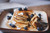 Stack of gluten-free vegan pancakes, made with premium brand Gluten Free Things Waffle and Pancake Flour Mix is gluten-free and vegan.   Make fluffy pancakes and waffles that embrace flavor and wonderful rising action that our customers say is even better than other waffles and pancake mixes that are full of gluten.  Gluten Free Things Waffle and Pancake Flour Mix is one of our incredibly popular items.   Prepare your waffle or pancake batter with or without eggs, with or without milk. The flavor is in our secret recipe that pleases even non-gluten free appetites.   Add a little more liquid for a thinner batter and surprise mom with gluten-free crepes filled with all of your favorites.   Gluten Free Things Waffle and Pancake Flour earns its rights to "breakfast of champions".