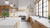 Modern cottage kitchen with Calacatta Altissmo countertops. Kitchen has natural lighting.