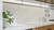 Loft kitchen with an open layout. Close up of a quartz countertop.