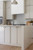 Taj Milan StratusQuartz featured in bright kitchen.