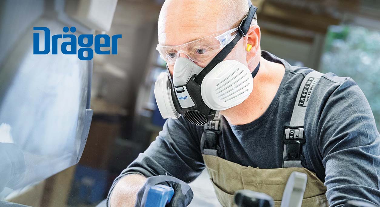 Factory worker wearing Draeger mask