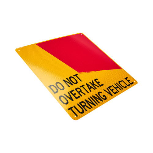 Sign Do Not Overtake writing - large amber/red