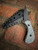 SCRAPITAR (WHITE GRANITE GRIPX/PURPLE G10/MCB RHODESIAN)