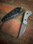 SCRAPITAR (WHITE GRANITE GRIPX/PURPLE G10/MCB RHODESIAN)
