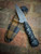 VARGR 3” (CHARCOAL DYMALUX/BLACK G10/COYOTE PLAID)