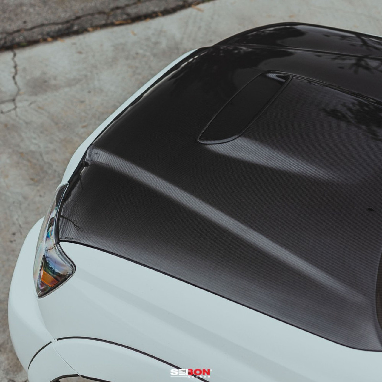 Seibon 05-11 Toyota Tacoma TR-Style Carbon Fiber Hood - HD05TYTA-TR User 1