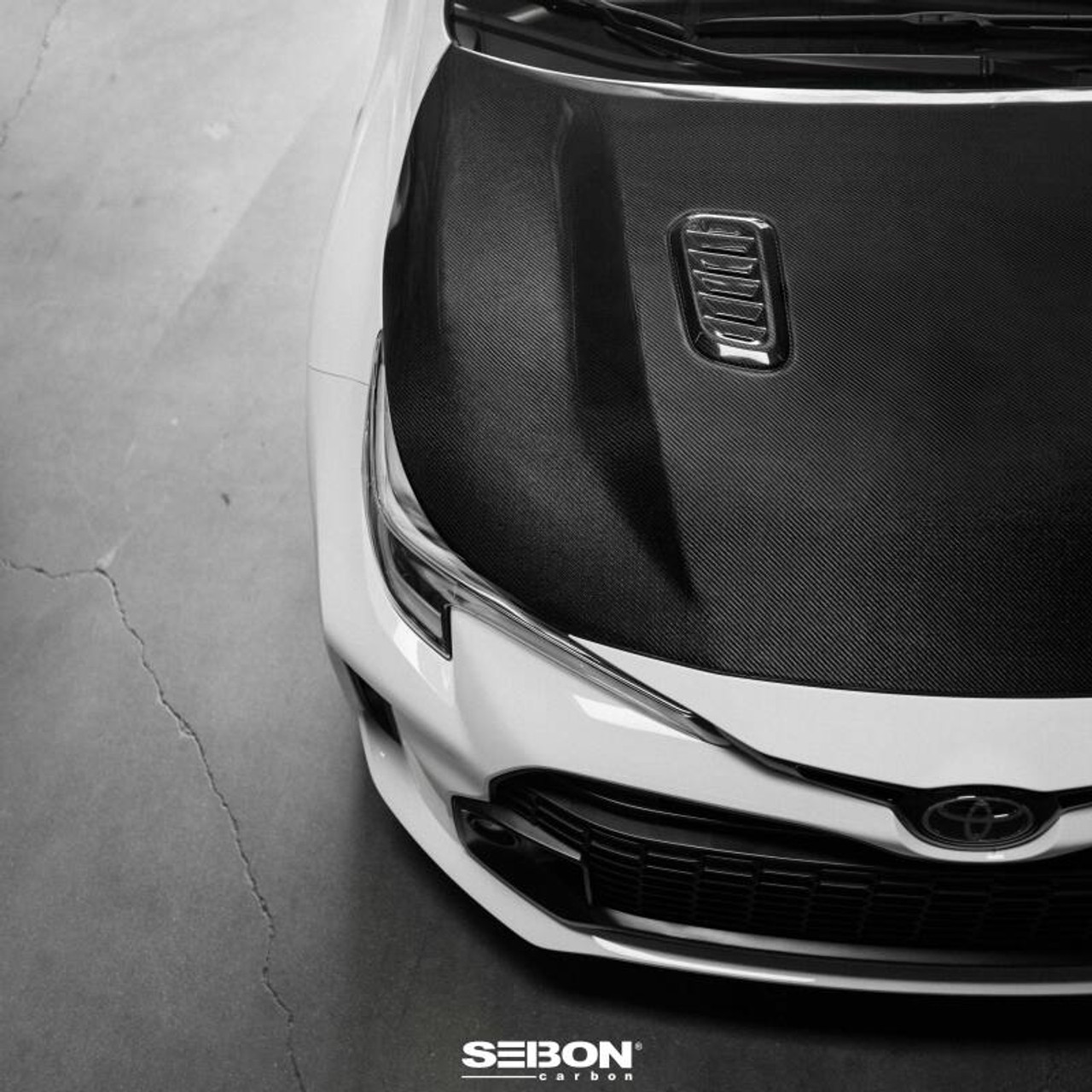 Seibon 2023 Toyota GR Corolla OE-Style Carbon Fiber Hood - Gloss Finish - HD23TYGRCOR-OE User 1