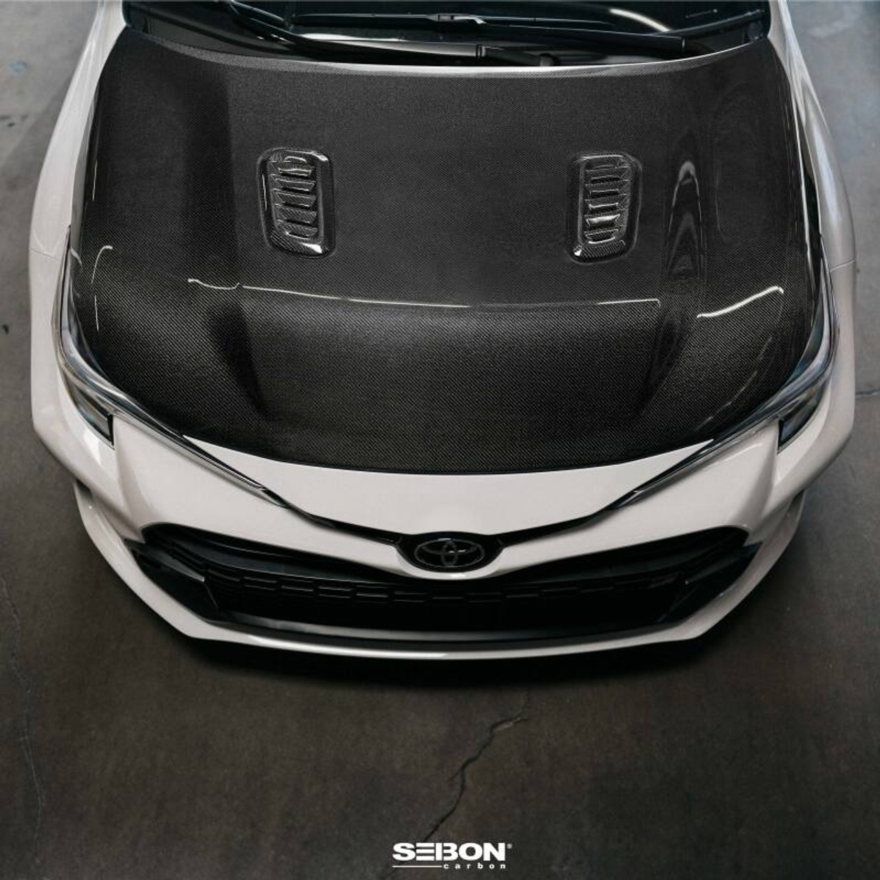 Seibon 2023 Toyota GR Corolla OE-Style Carbon Fiber Hood - Gloss Finish - HD23TYGRCOR-OE User 1