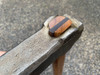 Showing the American walnut wedge and top of hammer head.