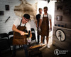Participant hammering steel on an anvil during a blacksmithing workshop in Sydney