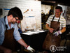 Participants learning blacksmithing skills during a hands-on workshop at Nordic Edge in Sydney