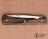 Liner lock folder designed by Pascal Renoux with liner lock, 12c27 blade and Ziricote handle (https://www.couteaux-berthier.com/entretoise-knife-ziricote-handle,us,4,EntretoiseZiricote.cfm)