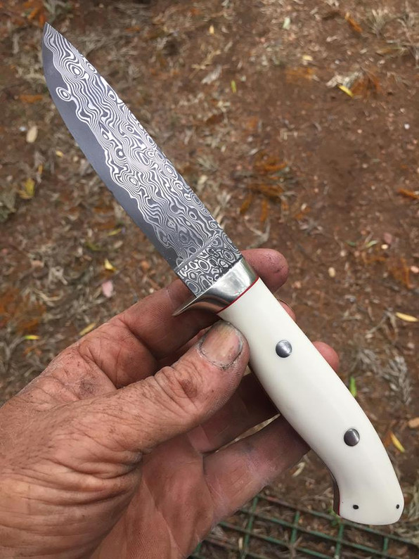 Good handle material decision on a damascus blade